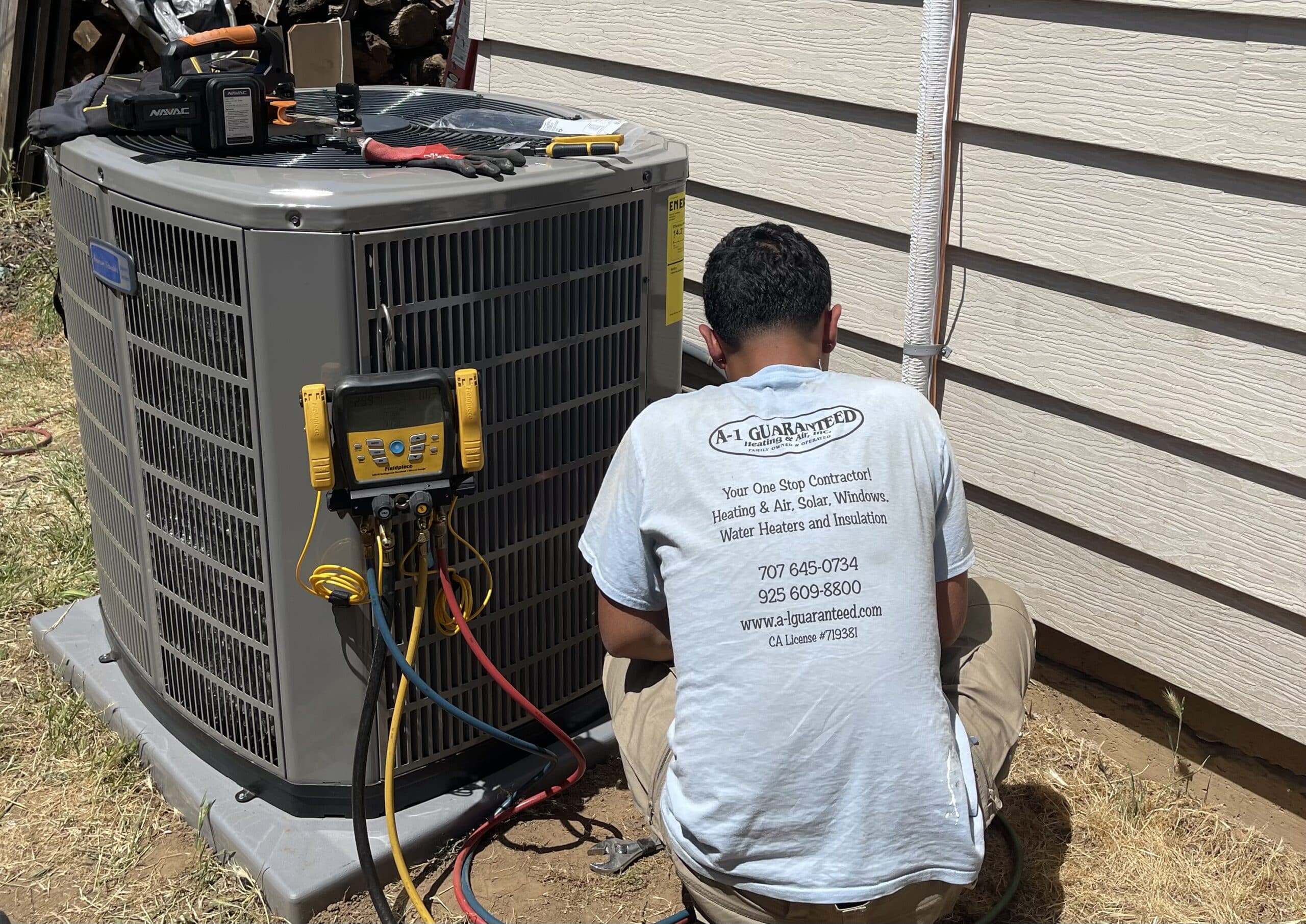 A-1 Guaranteed team member working on heat pump