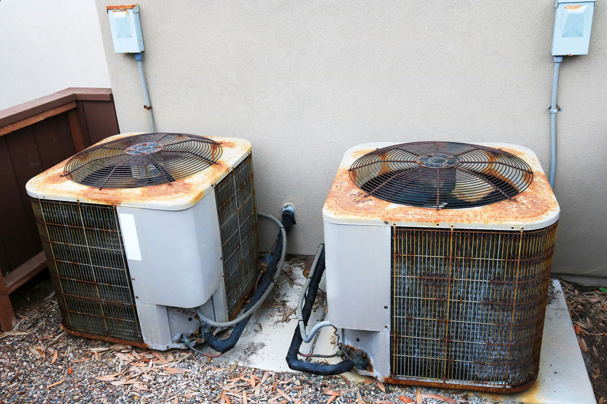 Two rusty HVAC units